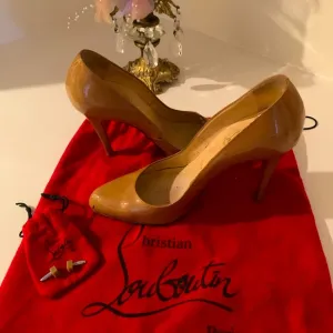 Authentic Christian Louboutin Tan Stiletto Heels with Signature Red Sole