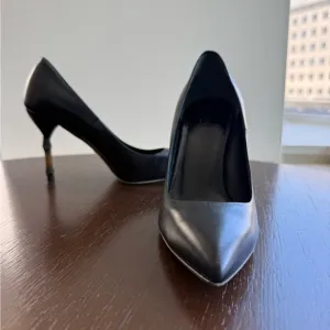 Authentic Gucci Black Women's Shoes with signature bamboo heel.