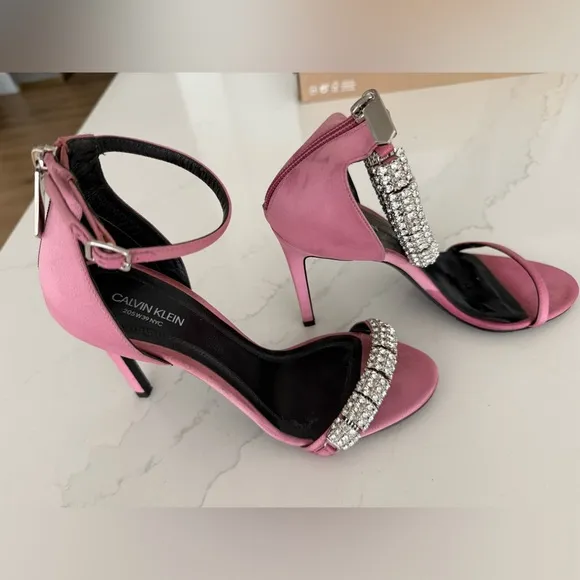 Beautiful satin with crystal embellishments.