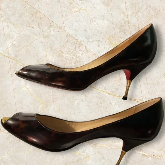 Christian Louboutin Women’s Patent Leather , Metal Pumps