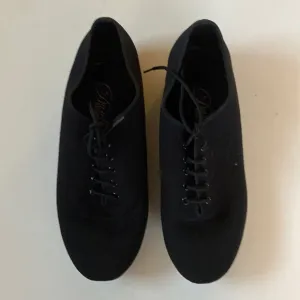 Dance America black shoes size 8.