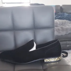 Elegant Black Loafers with Gold Accent
