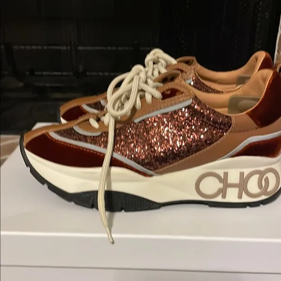 Jimmy Choo Women's Glitter Sneakers - Brown. Gently used. Some marks .