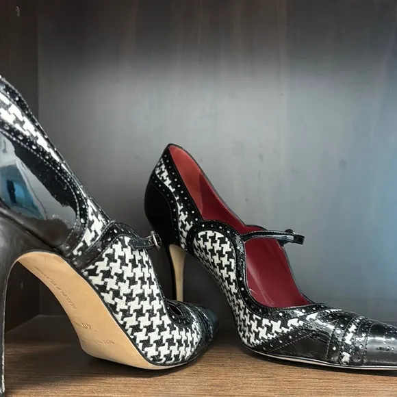 Manolo Blahnik Black and Red Heels with Elegant Design