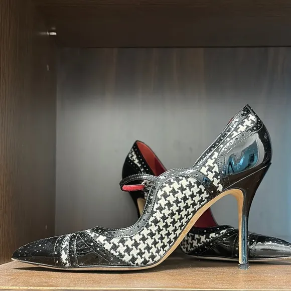 Manolo Blahnik Black and Red Heels with Elegant Design