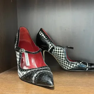 Manolo Blahnik Black and Red Heels with Elegant Design