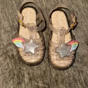 Mini Melissa rainbow glitter star shoes. toddler size 10