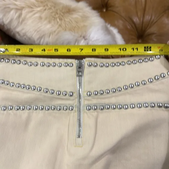 NWT Coach cream miniskirt with silver studs