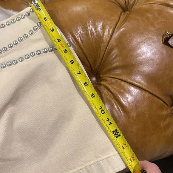 NWT Coach cream miniskirt with silver studs