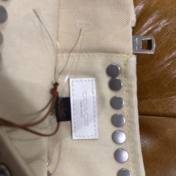 NWT Coach cream miniskirt with silver studs