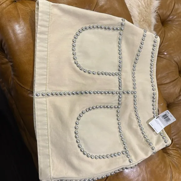 NWT Coach cream miniskirt with silver studs