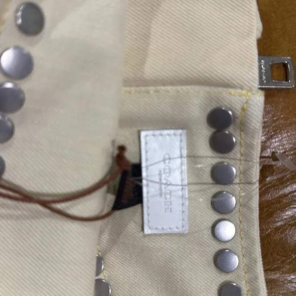 NWT Coach cream miniskirt with silver studs