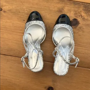 ON 34th Women's Silver Glitter and Black Slingback Heels