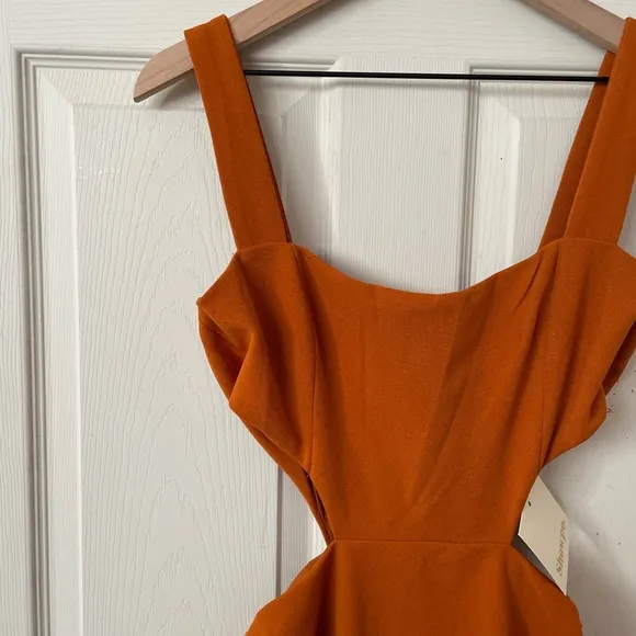 Revolve showpo  MILAH MIDI DRESS - SQUARE NECK CUT OUT DRESS ORANGE