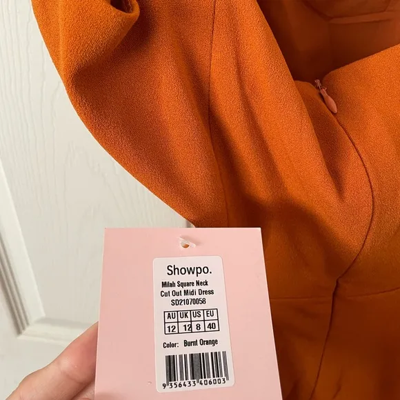 Revolve showpo  MILAH MIDI DRESS - SQUARE NECK CUT OUT DRESS ORANGE