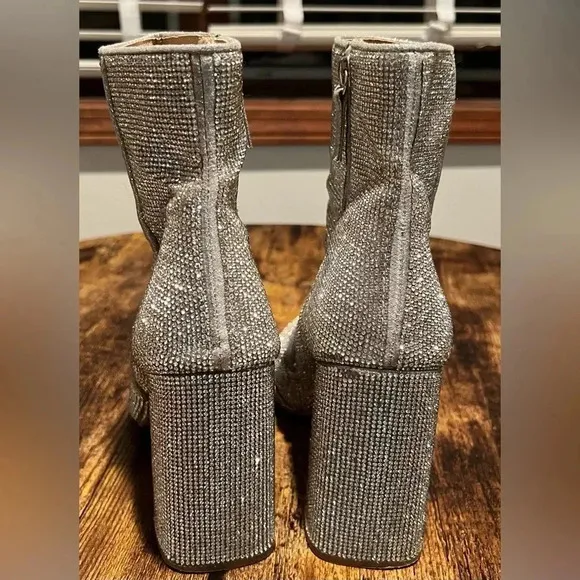 Steve Madden | NOTICED-R silver disco bootie. Size: 10.