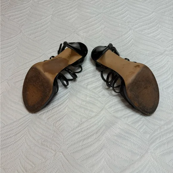 Stuart Weitzman women’s Black Patent Leather Strappy Heel Shoes. Size 8.5