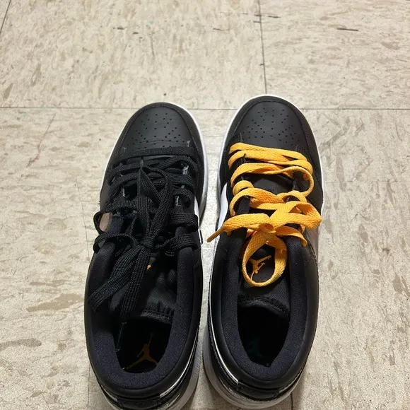 Yellow and black Jordan shoes